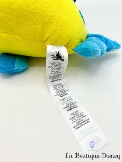 Peluche Polochon La Petite Sirène Disney Store 2023 Poisson Jaune Bleu 38 Cm 11 Peluche Polochon La Petite Sirène Disney Store 2023 Poisson Jaune Bleu 38 Cm -Disney peluche polochon brillant disney store peluche poisson jaune bleu la petite sirene 6